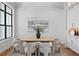 Dining room featuring an art piece and table at 5032 W Longfellow Ave, Tampa, FL 33629