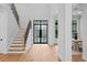 Welcoming entryway with modern black metal and glass door at 5032 W Longfellow Ave, Tampa, FL 33629