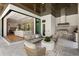 Spacious outdoor entertaining area with a built-in kitchen and comfortable seating at 5032 W Longfellow Ave, Tampa, FL 33629