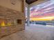 This fireplace offers great sunset views overlooking the pool at 5032 W Longfellow Ave, Tampa, FL 33629