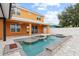 Large, refreshing pool with a spa and patio area at 6409 Oyster Island Cv, Apollo Beach, FL 33572