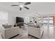 Spacious living room with ample natural light and comfortable seating at 6409 Oyster Island Cv, Apollo Beach, FL 33572