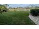 Backyard with pond view and fountain at 201 Silver Lake Dr # 101, Venice, FL 34292