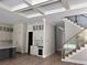 Kitchen view with coffered ceiling and a full bar with beverage refrigerator at 3109 W Knights Ave, Tampa, FL 33611