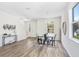 Dining room features hardwood floors and modern decor at 2437 Orange Harvest Pl, Seffner, FL 33584