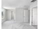 Bright bedroom with large window and access to other rooms at 2437 Orange Harvest Pl, Seffner, FL 33584