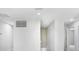 Bright hallway with recessed lighting and doors at 2437 Orange Harvest Pl, Seffner, FL 33584
