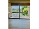 Spacious balcony offering scenic views of the lake and surrounding landscape at 10423 Carrollbrook Cir # 201, Tampa, FL 33618