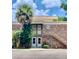 Brick building with two entrances and a stairway at 10423 Carrollbrook Cir # 201, Tampa, FL 33618