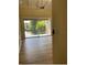 Bright living room with access to a private balcony overlooking the lake at 10423 Carrollbrook Cir # 201, Tampa, FL 33618