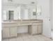 Bathroom with double vanity and large mirror at 2927 Minuteman Ln, Brandon, FL 33511