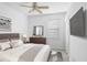 Main bedroom with ceiling fan and large window at 2927 Minuteman Ln, Brandon, FL 33511