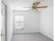 Bright bedroom with ceiling fan and window blinds at 2927 Minuteman Ln, Brandon, FL 33511