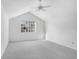 Spacious bedroom with vaulted ceiling and ceiling fan at 2927 Minuteman Ln, Brandon, FL 33511