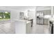Kitchen features stainless steel appliances and an island at 2927 Minuteman Ln, Brandon, FL 33511