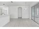 Bright kitchen with stainless steel appliances and white cabinets at 2927 Minuteman Ln, Brandon, FL 33511