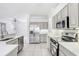 Kitchen with stainless steel appliances and ample counter space at 2927 Minuteman Ln, Brandon, FL 33511