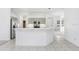 Kitchen features island, stainless steel appliances, and light cabinets at 2927 Minuteman Ln, Brandon, FL 33511