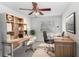 Home office with two workstations and built-in shelving at 2927 Minuteman Ln, Brandon, FL 33511