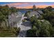 Stunning aerial view of a waterfront home with a large lot and beautiful landscaping at 806 Taray De Avila, Tampa, FL 33613