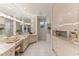 Large bathroom with a marble vanity and extensive storage at 806 Taray De Avila, Tampa, FL 33613