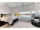 Main bedroom with lake view and relaxing sitting area at 806 Taray De Avila, Tampa, FL 33613