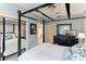 Bedroom with four-poster bed and mirrored closet at 806 Taray De Avila, Tampa, FL 33613