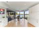 Breakfast room with glass table and stunning lake views at 806 Taray De Avila, Tampa, FL 33613