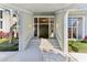 Elegant entryway with double doors and unique design at 806 Taray De Avila, Tampa, FL 33613