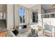 Open living space with high ceilings and a view of the lake at 806 Taray De Avila, Tampa, FL 33613