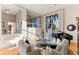 Spacious living room with large windows and lake views at 806 Taray De Avila, Tampa, FL 33613
