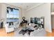 Bright living room featuring a grand piano and ample seating at 806 Taray De Avila, Tampa, FL 33613
