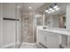 Bathroom with walk-in shower and white cabinets at 903 Heritage Groves Dr, Brandon, FL 33510