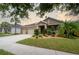 Two-story home with landscaped yard and attached garage at 903 Heritage Groves Dr, Brandon, FL 33510