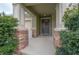 Inviting front porch with stone accents and a charming front door at 903 Heritage Groves Dr, Brandon, FL 33510