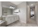 Elegant bathroom with double vanity and view of hallway at 903 Heritage Groves Dr, Brandon, FL 33510