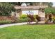 Arbor Oaks community entrance with stonework and festive wreaths at 903 Heritage Groves Dr, Brandon, FL 33510