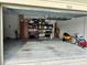 Spacious garage with ample storage shelving and room for bikes at 903 Heritage Groves Dr, Brandon, FL 33510