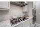 Modern kitchen with stainless steel appliances and white cabinetry at 903 Heritage Groves Dr, Brandon, FL 33510