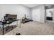 Bedroom area with a large space, carpet, closet, door, and lots of natural light at 11946 Brighton Knoll Loop, Riverview, FL 33579