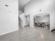 Open foyer with high ceilings, staircase and views to dining room at 11946 Brighton Knoll Loop, Riverview, FL 33579