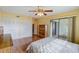 Bedroom with double bed, dresser, and closet space at 2400 Winding Creek Blvd # 3-202, Clearwater, FL 33761