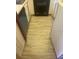 Kitchen flooring with wood-look vinyl at 2400 Winding Creek Blvd # 3-202, Clearwater, FL 33761