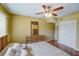 Spacious bedroom with wood flooring and ample closet space at 2400 Winding Creek Blvd # 3-202, Clearwater, FL 33761