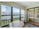 Sunroom with view of the bedroom and outdoor space at 2400 Winding Creek Blvd # 3-202, Clearwater, FL 33761