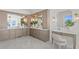 Elegant bathroom with double vanity and built-in cabinetry at 96 Martinique Ave, Tampa, FL 33606