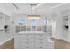 Large walk-in closet with center island, ample shelving, and hanging space at 96 Martinique Ave, Tampa, FL 33606