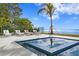 Private waterfront spa with tiled surround at 96 Martinique Ave, Tampa, FL 33606