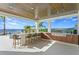 Outdoor kitchen with granite countertops and bar seating at 96 Martinique Ave, Tampa, FL 33606