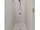 Modern shower with neutral tile and a rain shower head at 96 Martinique Ave, Tampa, FL 33606